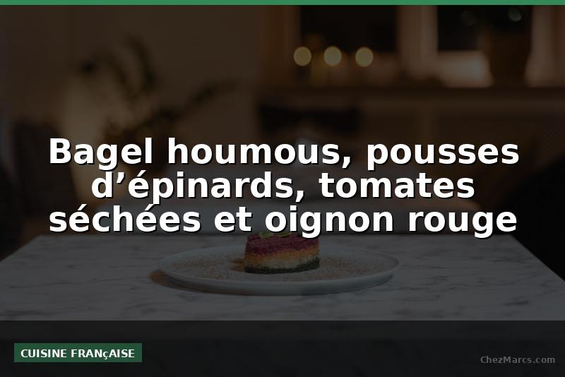 Bagel houmous, pousses d’épinards, tomates séchées et oignon rouge